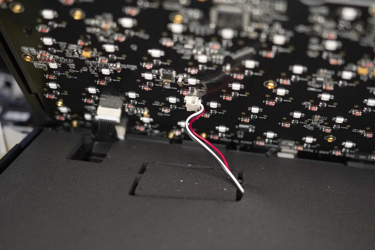 The battery cable plugged into the PCB