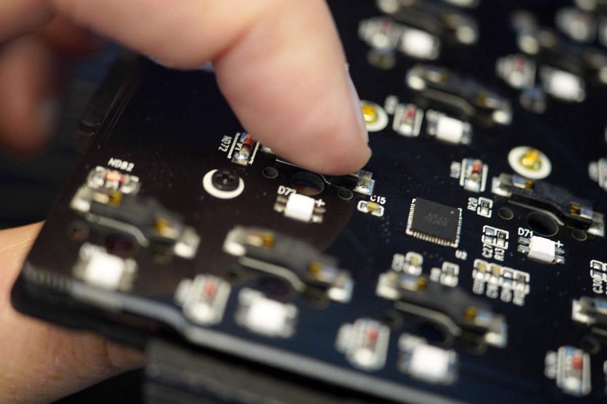 A finger behind the socket