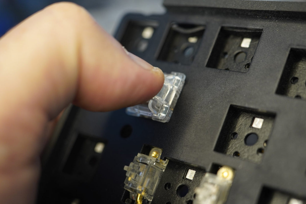 Pressing the switch in