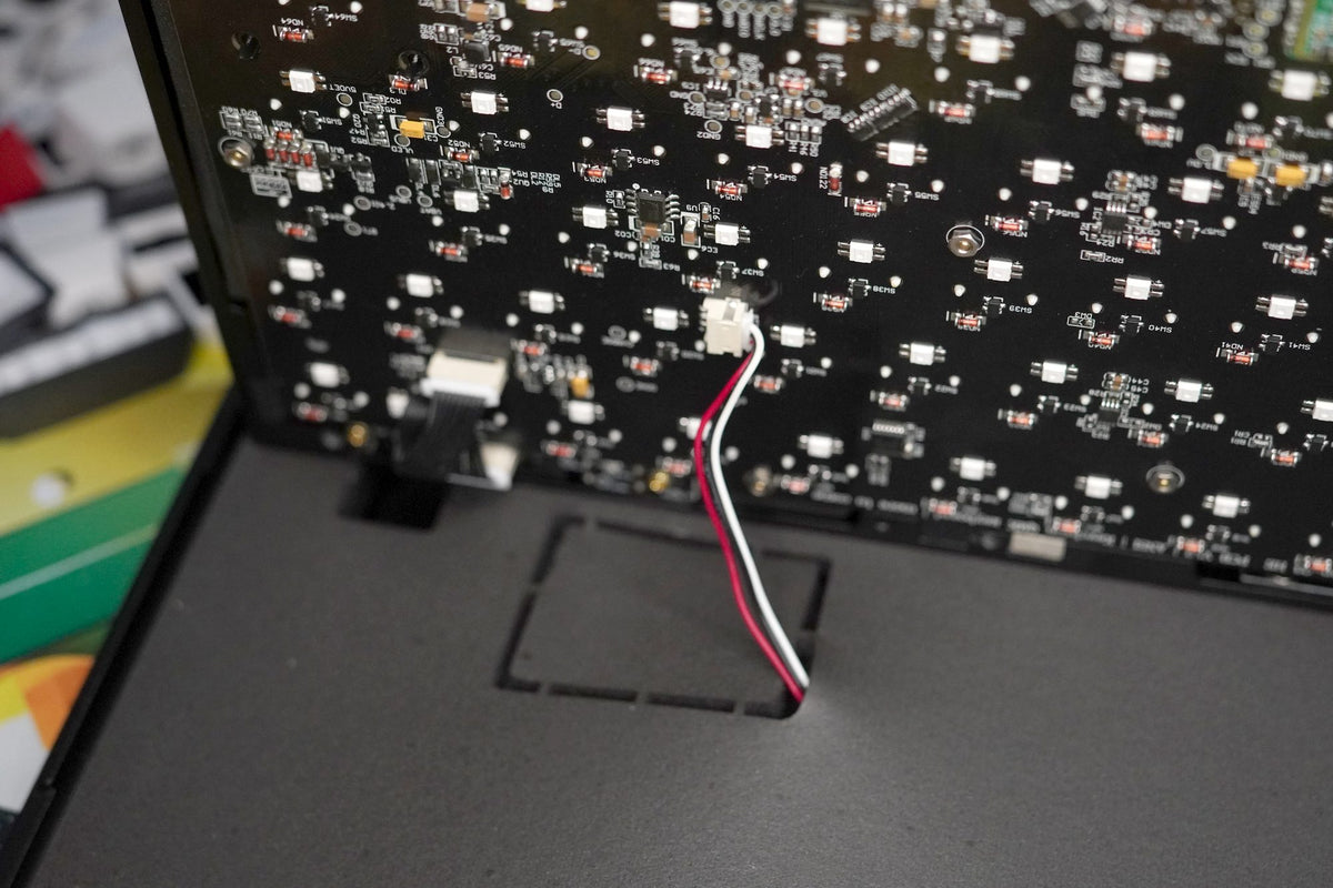 The battery reconnected over the case foam